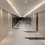 People walking into a company